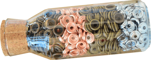 klick-klap presses spring part in all 4 of our color variants surface treatment enclosed in a glass bottle and sealed with a cork stopper.